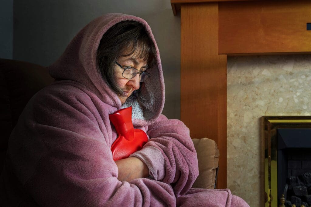 Senior Woman Wrapped in Dressing Gown